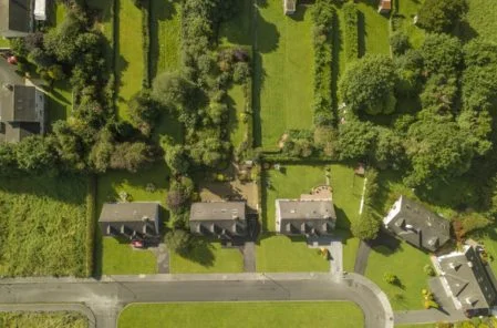 green fields and house