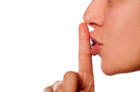 lady with finger at lips