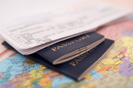passports on world map for sponsor licence