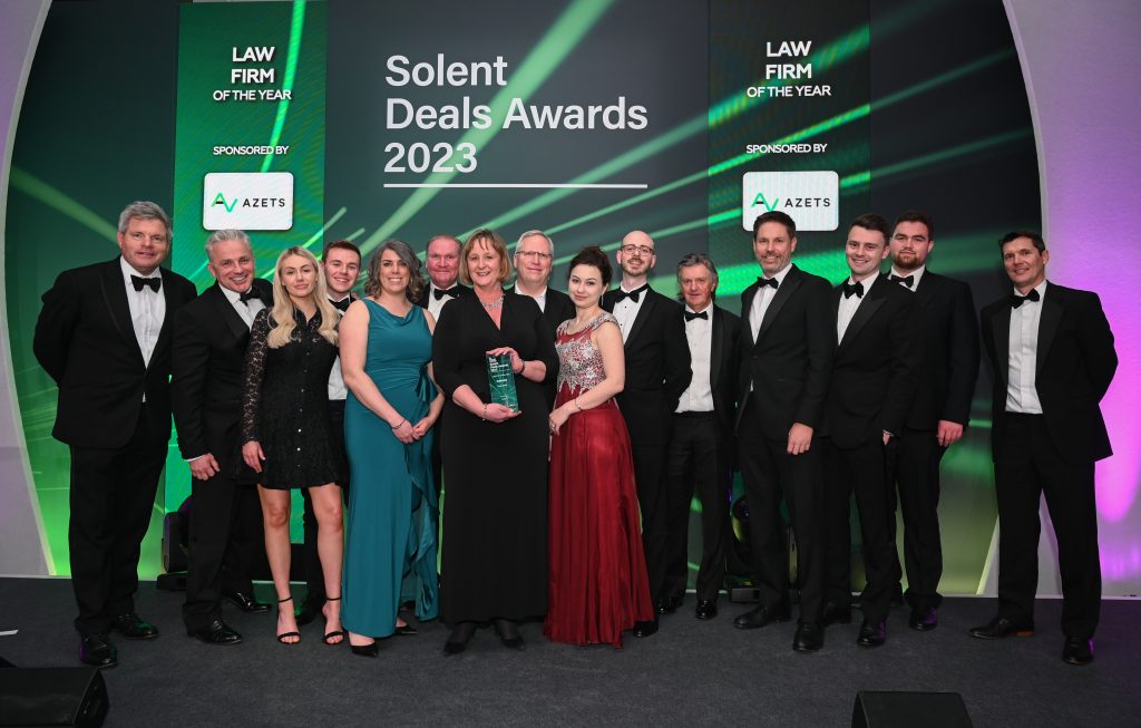 Corporate team winning law firm of the year 2023